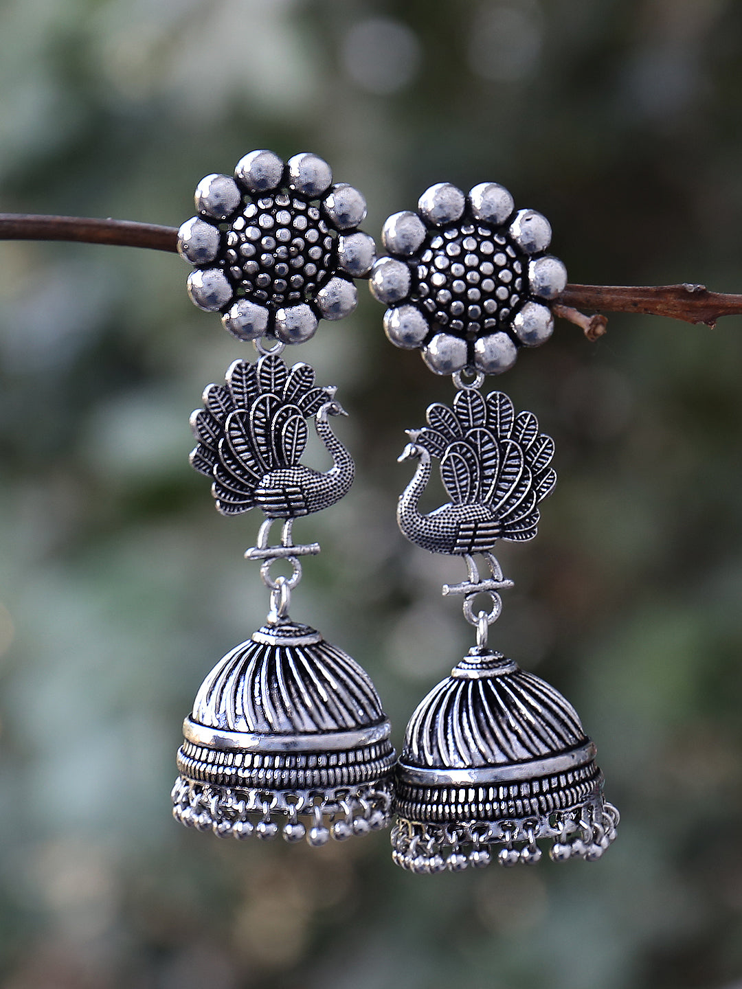 Silver Toned Three Tier Mriganka Jhumki